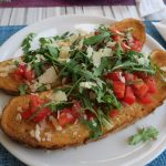 Bruschetta mit Rucola und Parmesan im Ristorante Pizzeria Garden in Malcesine