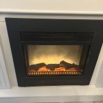 Eine Kaminsimulation im im HOME Suites Apartment in Braunlage